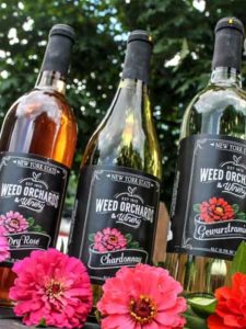 Three bottles of Weed's Wine.